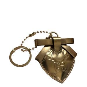 GUCCI Gold Guccisima Heart Keychain with Bow